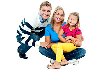 Image showing Portrait of happy couple smiling with cute daughter