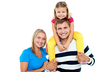 Image showing Photo of a cheerful family enjoying