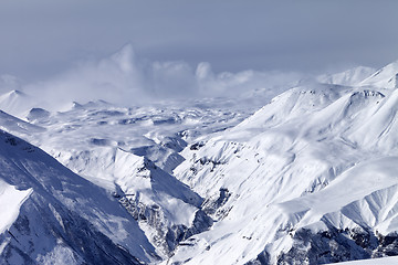 Image showing Snowy mountains in haze