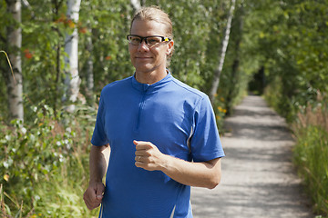 Image showing Trail runner in summer