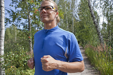 Image showing Trail runner in summer