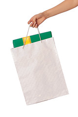 Image showing Paper bag with a box