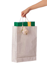 Image showing Paper bag with a box