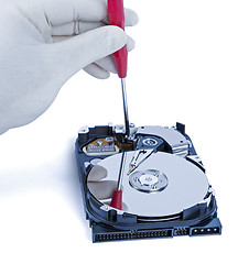 Image showing technician with open hard-disk