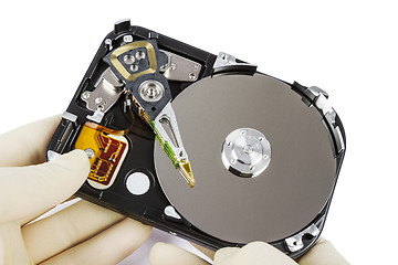 Image showing technician with open hard-disk