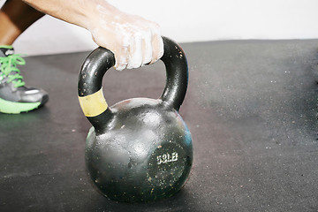 Image showing kettlebell crossfit workout on the gym