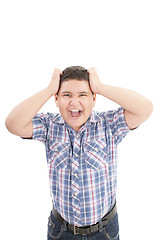 Image showing A boy screaming loud with mouth wide open