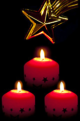 Image showing candles with star of Bethlehem