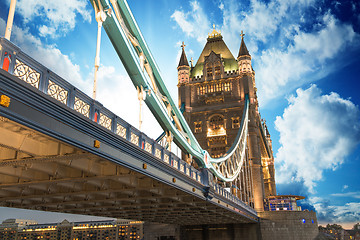 Image showing Famous Tower Bridge at sunset with clouds, seen from Tower of Lo