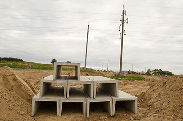 Image showing concrete block molds construction site 