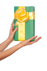 Image showing green box with yellow bow