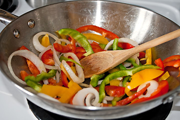 Image showing Stir Frying Vegetables in a Wok