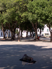 Image showing Tne beggar and the park