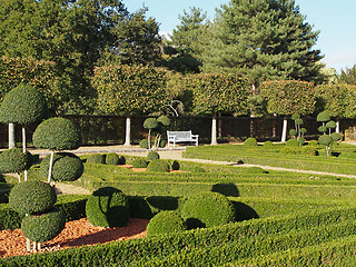 Image showing bench in a french garden in fall, anjou, France.