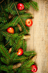 Image showing christmas fir tree with pinecones and apples