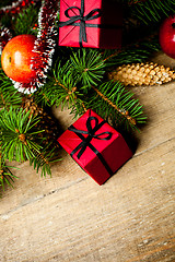 Image showing fir tree with pinecones, decorations and apples 