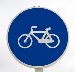 Image showing White bicycle sign in blue background.