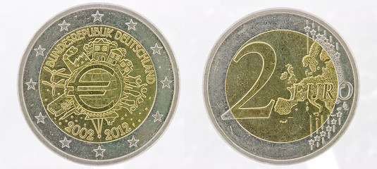 Image showing  German 2 Euro coins over black 