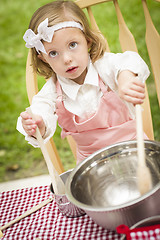 Image showing Adorable Little Girl Playing Chef Cooking