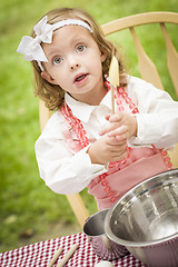Image showing Adorable Little Girl Playing Chef Cooking