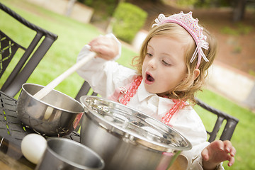 Image showing Adorable Little Girl Playing Chef Cooking