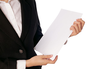 Image showing holds the white blank paper