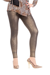 Image showing Sexy stylish legs in shimmering golden leggins