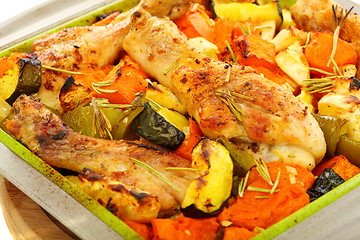 Image showing Chicken baked with pumpkin and rosemary.