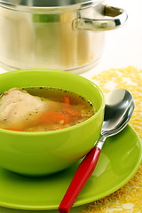 Image showing Chicken soup in a green bowl.