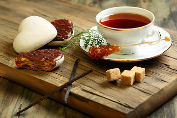 Image showing Ginger biscuits and a cup of tea.