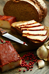 Image showing  Rye bread and bacon with red pepper, garlic.