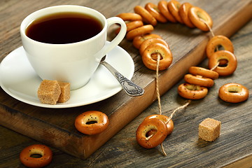 Image showing Small bagels in placer and a cup of tea.