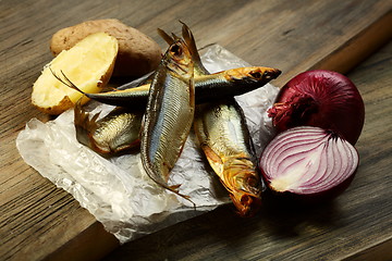 Image showing Smoked fish, potatoes and red onion.