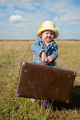 Image showing lonely girl with suitcase