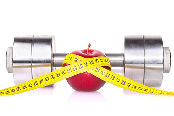 Image showing Dumbbell and an apple