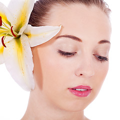 Image showing young beautiful woman portrait with white flower