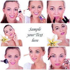 Image showing beautiful woman applying make up on face