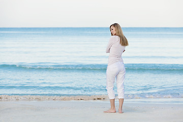 Image showing beautiful blonde woman alone at the beach
