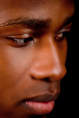 Image showing young african man with dark skin looking