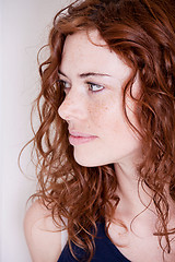 Image showing beautiful red head woman with freckle smiling