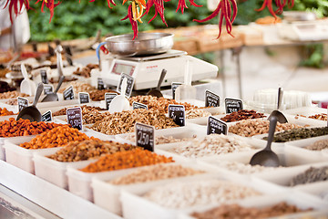 Image showing variation of nuts on market outdoor in summer