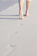 Image showing barefoot in the sand in summer holidays