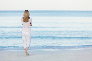 Image showing beautiful blonde woman alone at the beach