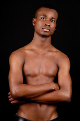 Image showing young african man with dark skin looking