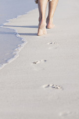 Image showing barefoot in the sand in summer holidays