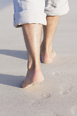 Image showing barefoot in the sand in summer holidays