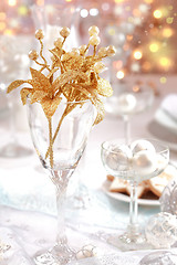 Image showing Golden branch on Christmas table