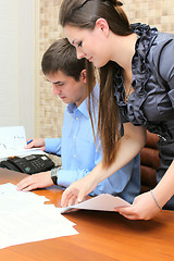 Image showing Girl and man working in the office