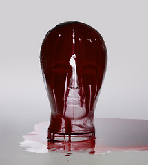 Image showing bloody glass head