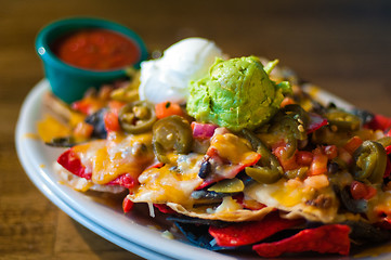 Image showing Nachos with cheese and guacamole